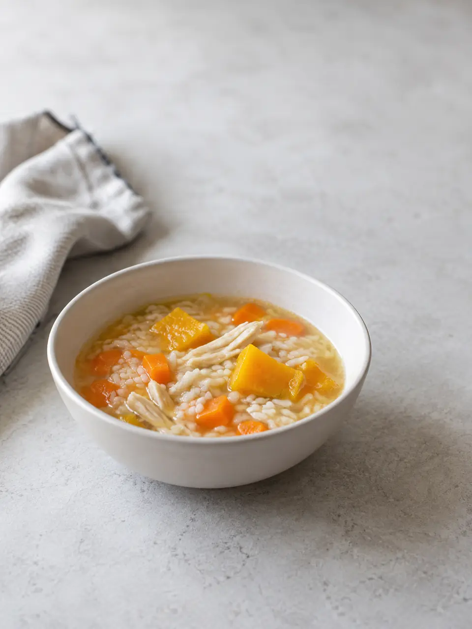 Arroz caldoso con pollo y zanahoria
